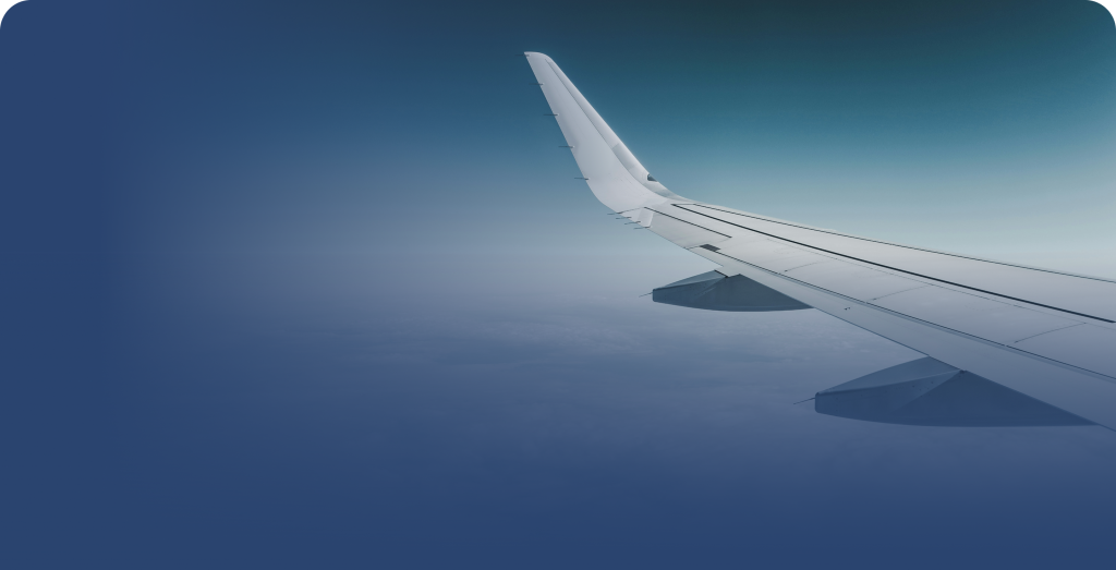 Airplane wing in the sky