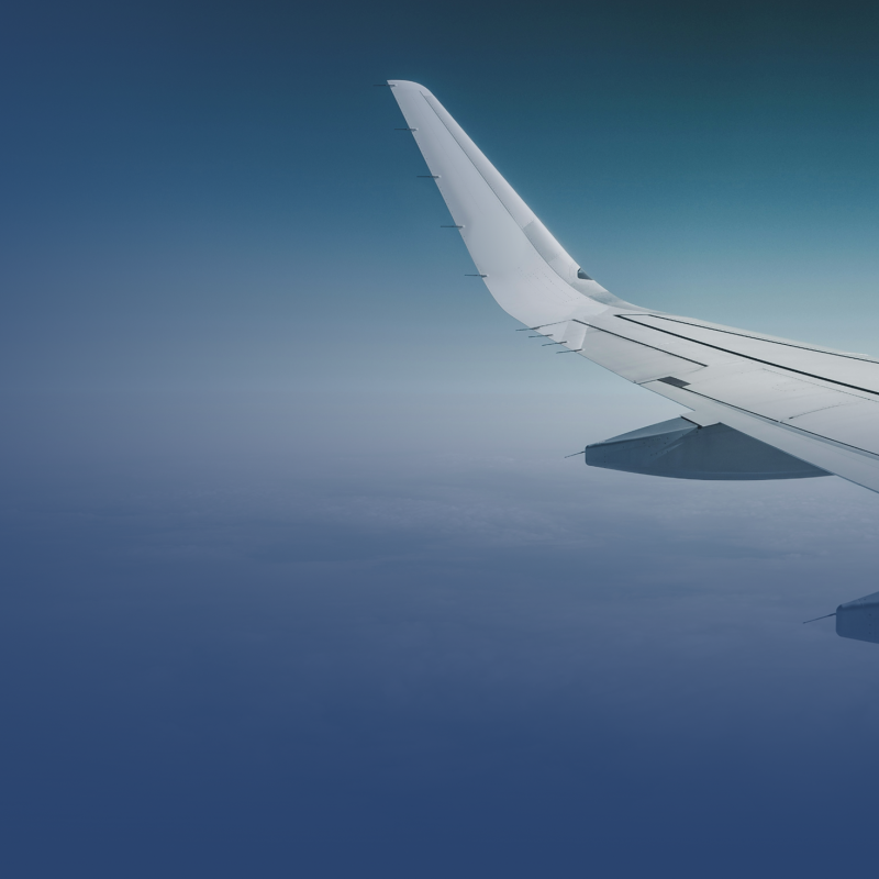 Airplane wing in the sky